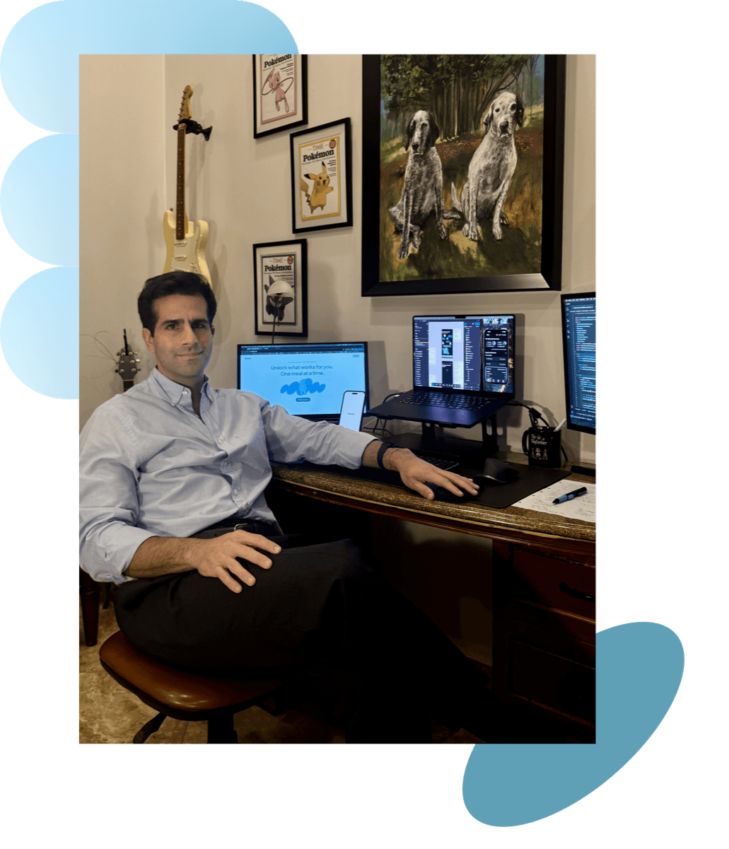 JS, founder of Bazu, at his desk